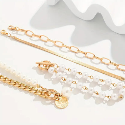 Chic Gold 4-Piece Bracelet Set ÃƒÂ¢Ã¢â€šÂ¬Ã¢â‚¬Å“ Snake, Pearls & Links | Gold