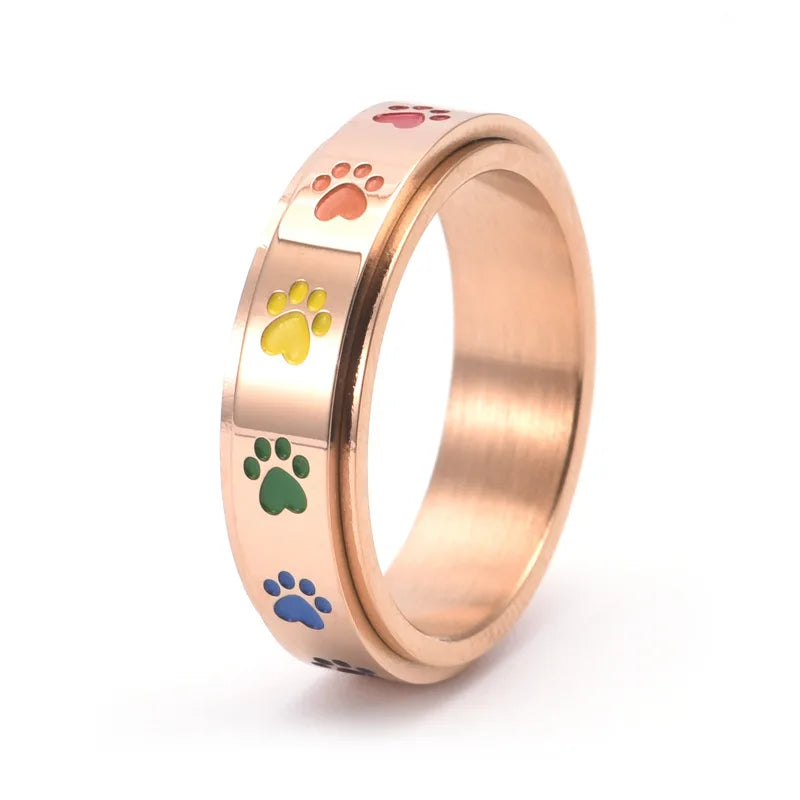 Spinning Stress Reducing Paw Ring ÃƒÂ¢Ã¢â€šÂ¬Ã¢â‚¬Å“ Stainless Steel with Rainbow Paws