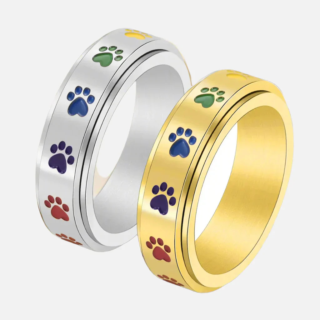 Spinning Stress Reducing Paw Ring ÃƒÂ¢Ã¢â€šÂ¬Ã¢â‚¬Å“ Stainless Steel with Rainbow Paws